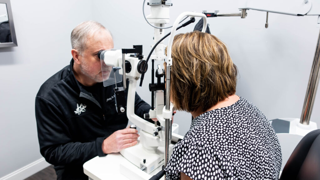 Dr. Jeffrey Wipfli performing a cataract evaluation 