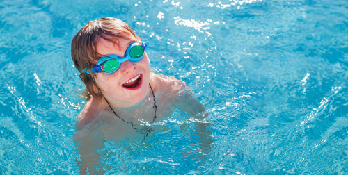 Little Boy At Swimming Pool